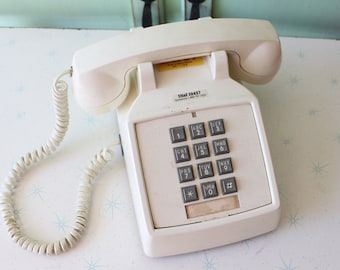 Teléfono de disco blanco de los años 60: decoración retro kitsch para el hogar