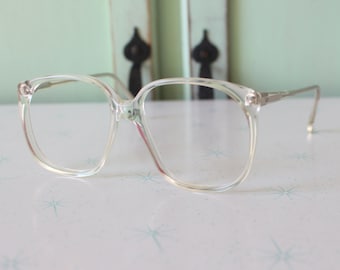 Vintage JACKIE O Glasses..new old stock. classic. groovy. twiggy. mod. retro glasses. librarian. secretary. woodstock. oversized. clear