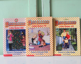 May include: Three paperback books from the Baby-Sitters Little Sister series. The books are titled "Karen's Christmas Tree", "Karen's Kittycat Club", and "Karen's Little Sister".