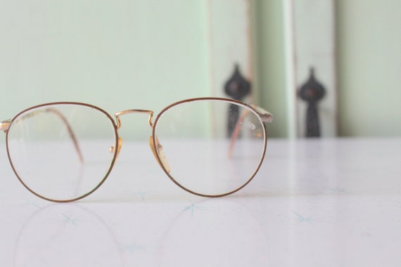 Vintage LENNON EYEWEAR....librarian. round lens. g