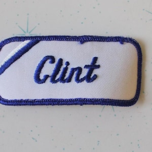 Parche con el nombre CLINT, años 70 y 80... disfraz. Accesorios de los años 70 y 80. Hipster. Padre. Papá. Abuelo. Mecánico. Conserje. Trabajador. Letra C. Regalo.