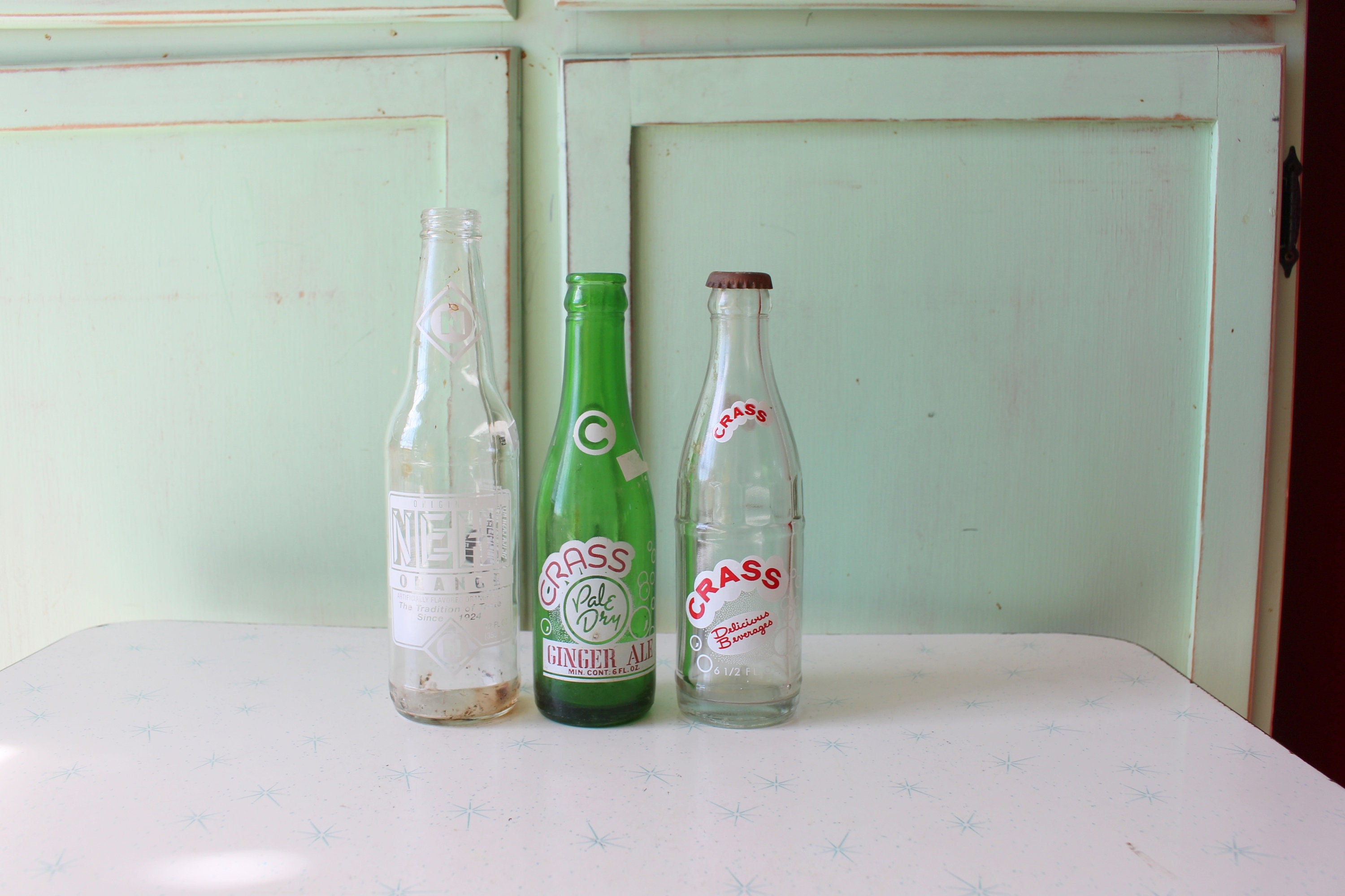 RETRO 1960s 1970s Set of 3 SODA BOTTLES......kitchen. groovy glassware.  funky. drink. kitsch. novelty. decor. antique. mid century. rare