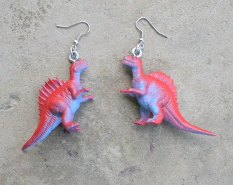 DINOSAUR Earrings...dangly. novelty. dino. retro. science. kitsch jewelry. plastic toy. purple. red dino. costume party. funky. kooky. odd