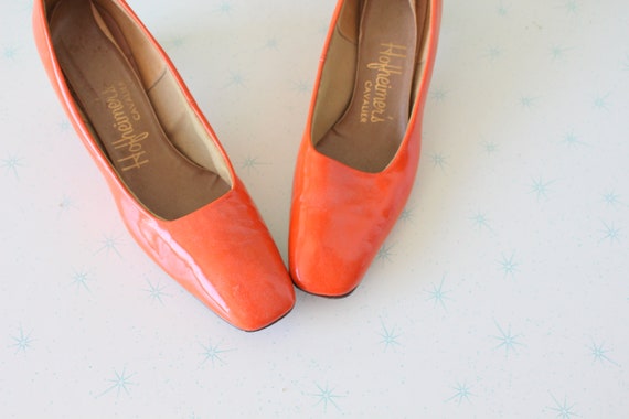 orange designer heels
