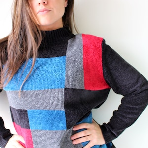 1980s Multi Colored Sweater.unicorn. colorful. bright. retro. rainbow. 1980s sweater. rad. fun. oversized sweater. autumn. black. blue. red