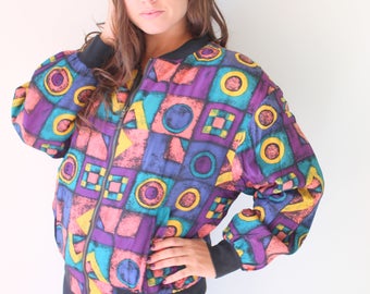 Nylon bomberjack uit de jaren 80, abstracte geometrische print, maat Small