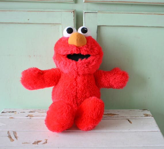 creepy elmo doll