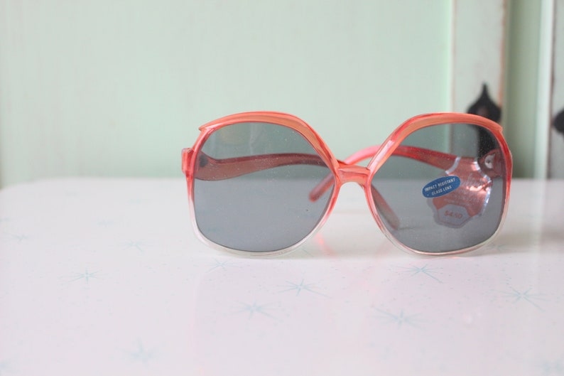 1970s MOD GIRL Sunglasses..twiggy. womens eyewear. big lens. funky. woodstock. hippie. rare. red. deadstock sunglasses. glass. mod image 1