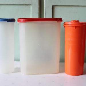 Vintage Tupperware 1970s Retro Canister Bowls Orange Blue Set LOT.....vintage home.  home decor. pasta. pantry. storage containers with lids