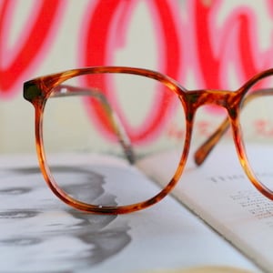 Vintage JACKIE O Glasses..new old stock. classic. groovy. twiggy. mod. retro glasses. librarian. secretary. woodstock. oversized