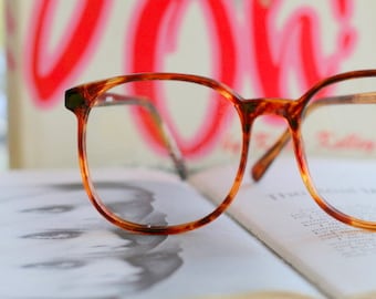 Vintage JACKIE O Glasses..new old stock. classic. groovy. twiggy. mod. retro glasses. librarian. secretary. woodstock. oversized