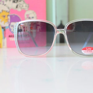 NOS Vintage 1980s SUNGLASSES....unisex. UV lens. retro. s. new old stock. boho. hipster. costume. retro. rad. . mod. cream