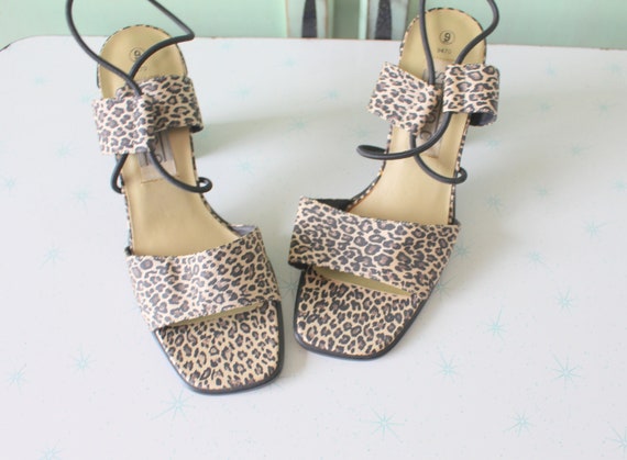 Red animal shop print heels
