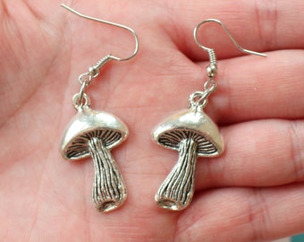 MUSHROOM Earrings...tibetan silver. antique silver charm. mushroom earrings. woodstock. retro. kitsch. boho. metal. . hipster. hippie.