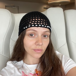 Crochet black mesh hat with beaded charms
