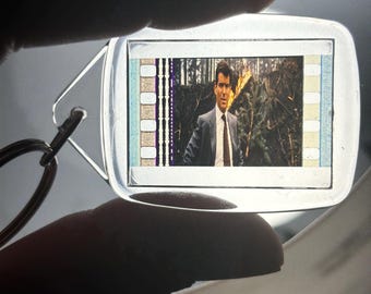 Llavero de película de 35 mm: 007 El mundo nunca es suficiente (James Bond)