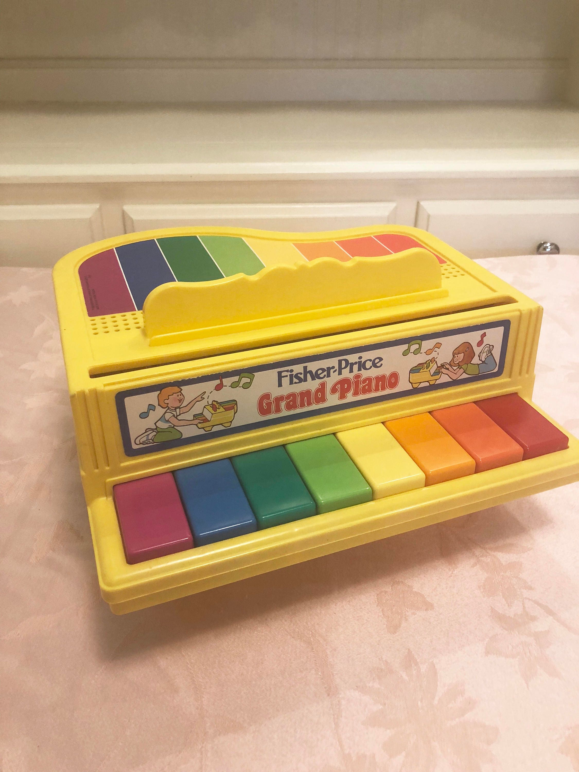 fisher price grand piano