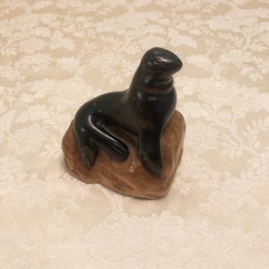 Solid Wood Figurine Sea Lion Hand Carved Wood Sculpture With Dark Wood Sea Lion  And Lighter Wood Base Rock