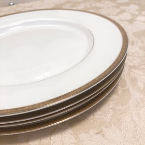 18K Lauren Gold St. Nicholas Square With Stenciled Gold Detailed Edges Fine Porcelain With Gold Rims Elegant White Porcelain Dinner Plates
