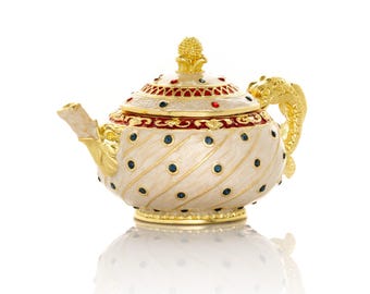 Tetera blanca con lunares de colores