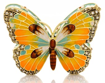 Caja de baratijas con forma de mariposa