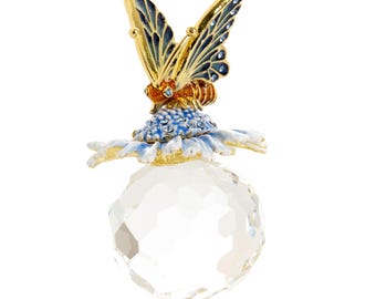 Butterfly sitting on Flower and Crystal