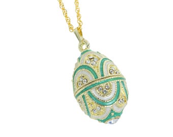 Collar con colgante de huevo dorado y azul claro