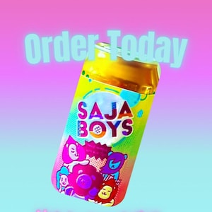 May include: A colorful can with the text "SAJA BOYS" and cartoon characters. The words "Order Today" are above the can. The background is a gradient of pink and blue.