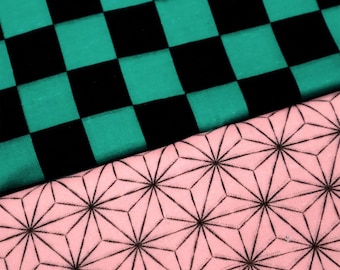 May include: Close-up of two fabric patterns. One features a black and teal checkerboard design. The other has a pink background with a repeating black geometric star pattern. The fabrics are likely for crafting or apparel.