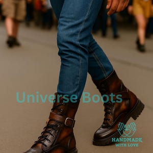 May include: Brown leather boots with a buckle and lace-up design. The boots have a rugged sole and are worn with blue jeans. The text "Universe Boots" and "HANDMADE WITH LOVE" are visible.