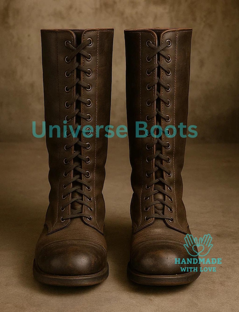 May include: A pair of brown leather boots with a lace-up design. The boots are tall, reaching the mid-calf, and feature a textured finish. The text "Universe Boots" is visible on the image, along with a "Handmade with Love" logo.