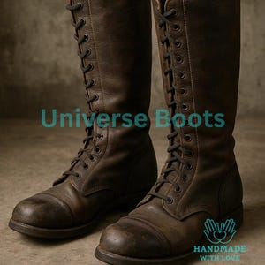 May include: A pair of brown leather boots with a lace-up design. The boots are knee-high and have a distressed appearance. The text "Universe Boots" and "HANDMADE WITH LOVE" are visible.