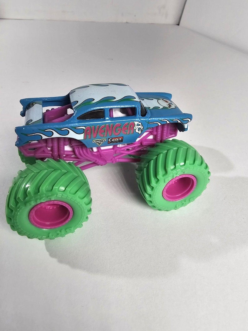 Spin Master Monster Jam Avenger Truck NITRO NEON TIRES New 1:64 image 1