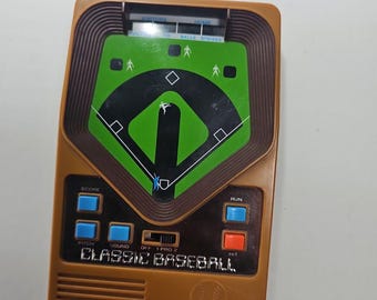 Juego de béisbol electrónico portátil clásico de Mattel, año 2001 (funciona)