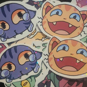 Pegatina de gatito feliz y triste