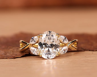 Ovalslipad förlovningsring, vigselring med tvinnad vinranka, ring med markis och sidosten, löftesring i 14 karat guld, brudring med labbodlad diamant