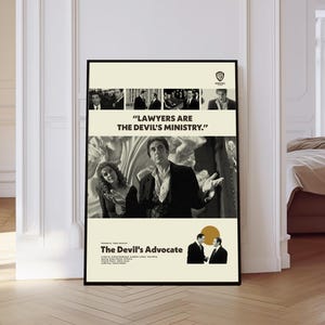 May include: A framed movie poster for "The Devil's Advocate" with black and white images of actors. The poster features the quote "Lawyers are the Devil's Ministry." The film's title and credits are at the bottom, with a Warner Bros. logo at the top.