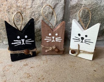 Set of 3 wooden cat ornaments:  black, white and brown