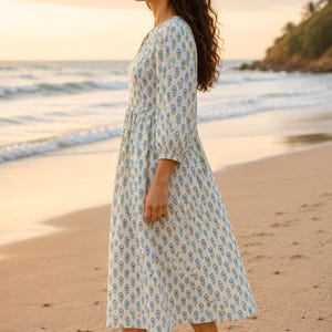 Relaxed fit vintage-inspired floral midi dress, lightweight beachwear outfit