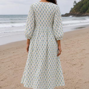 Loose fit blue printed dress with three-quarter sleeves, casual seaside look back view
