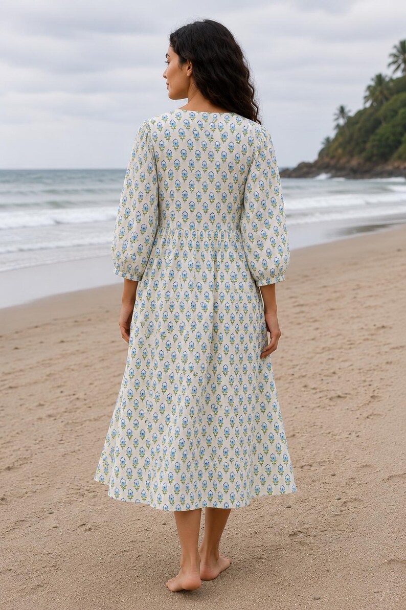 Loose fit blue printed dress with three-quarter sleeves, casual seaside look back view