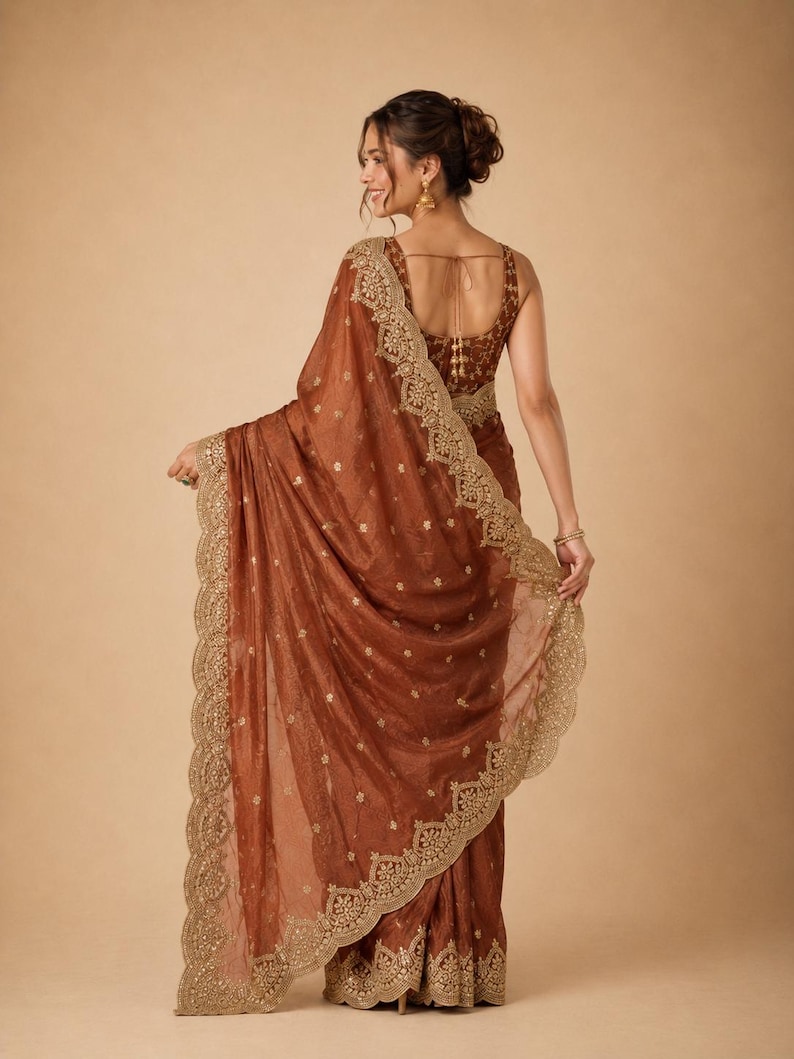 Back pose of Women wearing Brown Embroidered Fendy Chiffon Saree for weddding, Party wear Outfit for UK Girls
