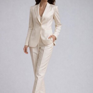 Sophisticated women’s blazer outfit with satin trousers