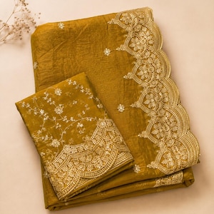 Floor shot of Golden Embroidered Fendy Chiffon Saree for women, Party wear Outfit for UK Girls