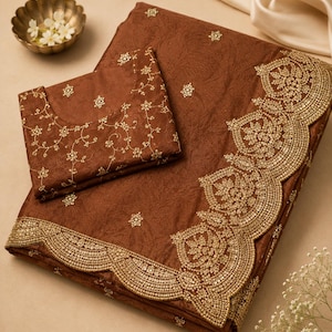Floor shot of Brown Embroidered Fendy Chiffon Saree for women, Party wear Outfit for UK Girls