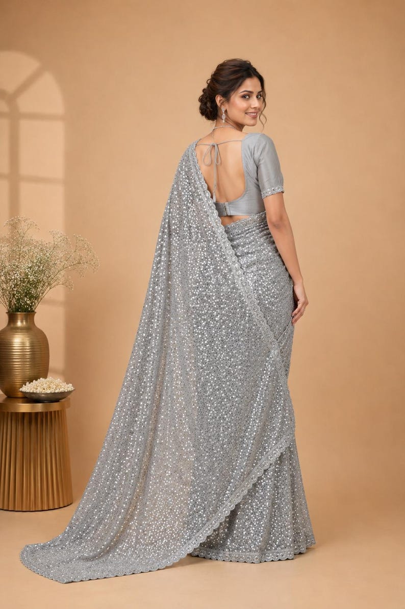 Fancy glitter saree in soft grey with matching blouse and festive designer aesthetic