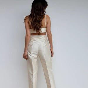Women’s formal wear blazer and pant set in cream color