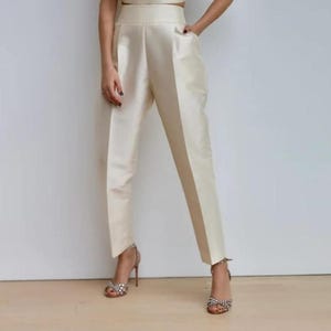 Women wearing beige Color Premium Soft Silk High Waist Pants, Silk Pants, Premium Silk Pants for Women, Silk Trousers, Slim Office Wear Pants and Trousers