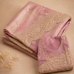 Floor shot of Pink Embroidered Fendy Chiffon Saree for women, Party wear Outfit for UK Girls