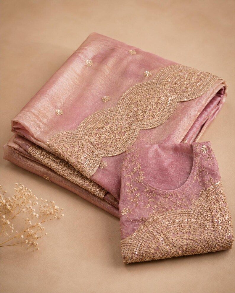 Floor shot of Pink Embroidered Fendy Chiffon Saree for women, Party wear Outfit for UK Girls
